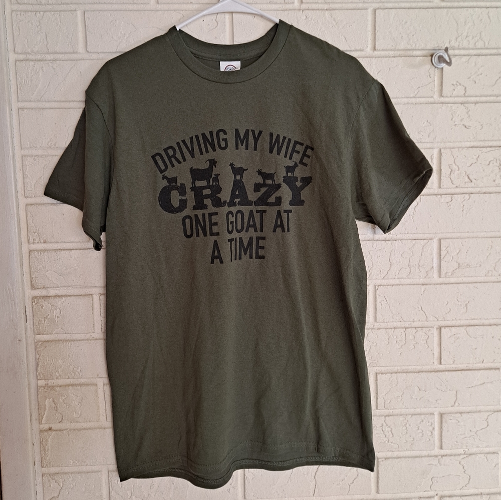 Green short sleeve t shirt "driving my wife crazy on goat at a time" med…